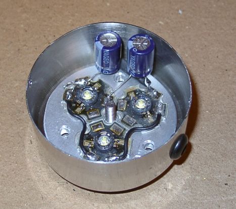 Half-assembled triple LED headlight